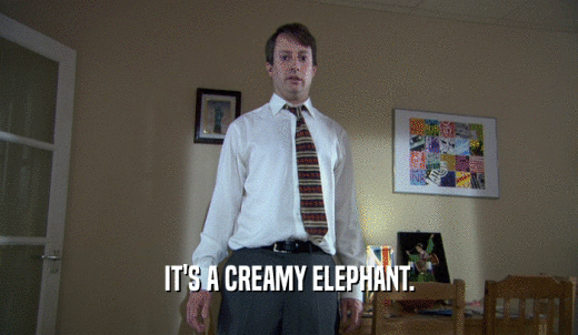 IT'S A CREAMY ELEPHANT.  