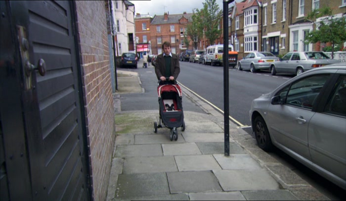 'IN THE CORNER OF JD SPORTS WITH A RUSK AND TEN EUROS TAPED TO IT.' 