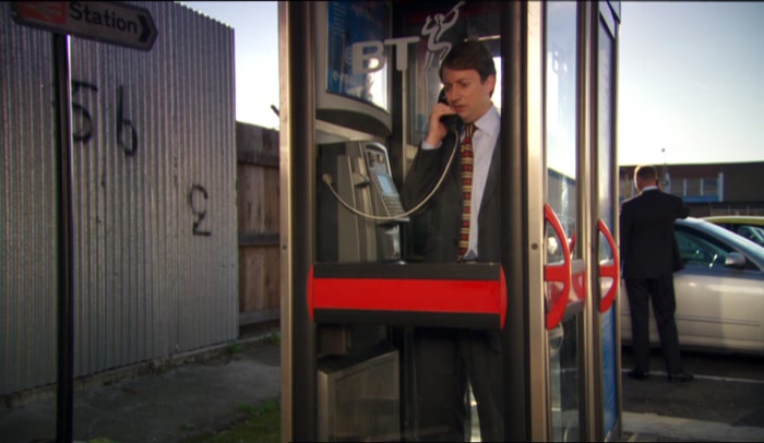 I'M IN A PHONE BOX.  