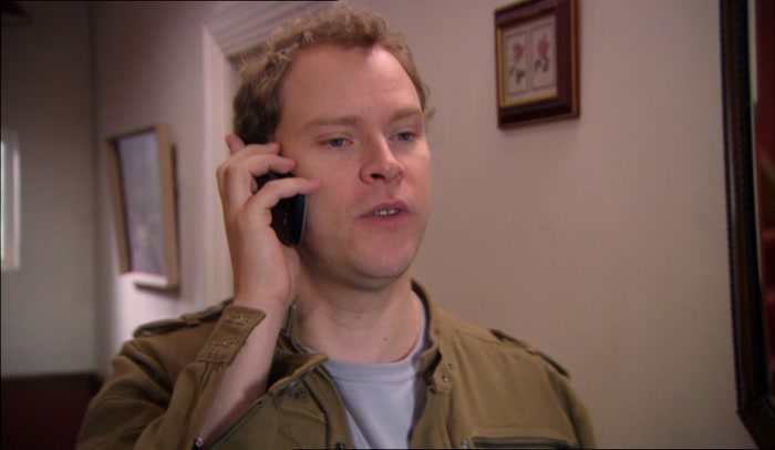'THE GREEDY GOBFATHER GOBBLING PIZZA ON HIS GODSON'S TIME.' 