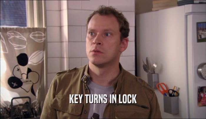 KEY TURNS IN LOCK  