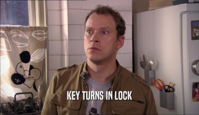 KEY TURNS IN LOCK  