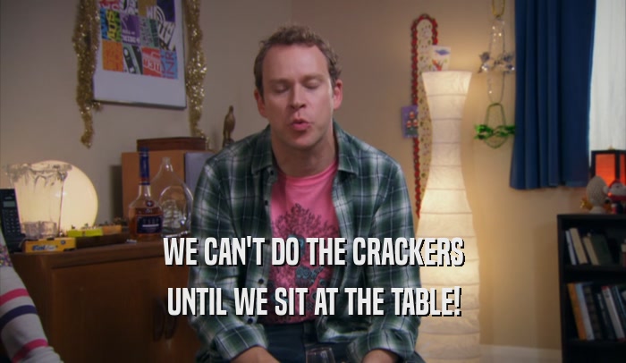WE CAN'T DO THE CRACKERS UNTIL WE SIT AT THE TABLE! 