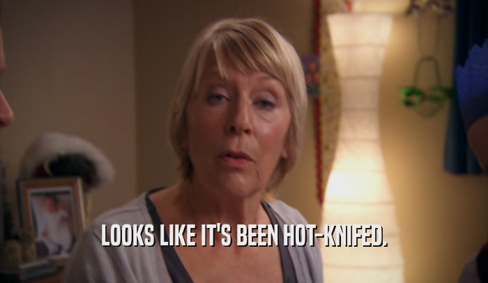 LOOKS LIKE IT'S BEEN HOT-KNIFED.  