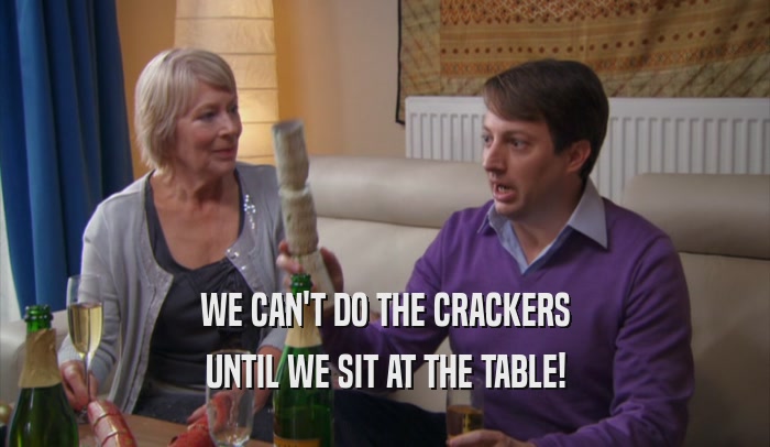 WE CAN'T DO THE CRACKERS UNTIL WE SIT AT THE TABLE! 