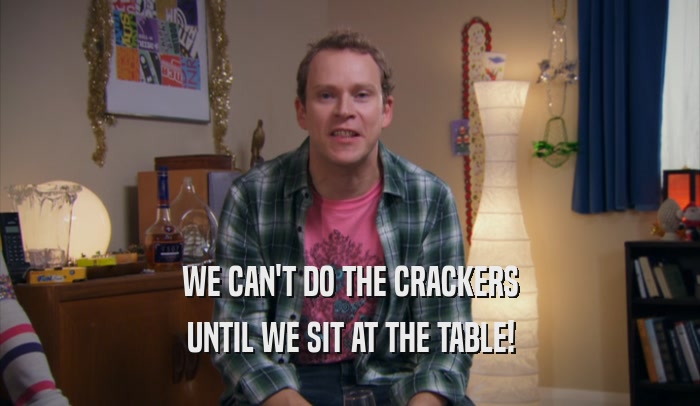 WE CAN'T DO THE CRACKERS UNTIL WE SIT AT THE TABLE! 