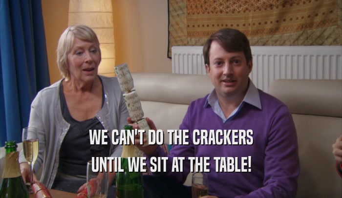 WE CAN'T DO THE CRACKERS UNTIL WE SIT AT THE TABLE! 