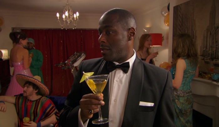 'HMM. HE'S CONNED ME TO HIS PARTY.  