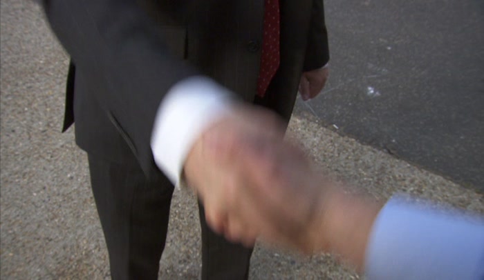 THIS HANDSHAKE'S ONLY JUST BEGINNING.'  