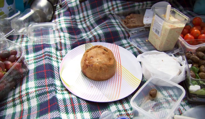 'HE DID SPEND A LONG TIME IN THE KITCHEN PREPARING THE PICNIC. 