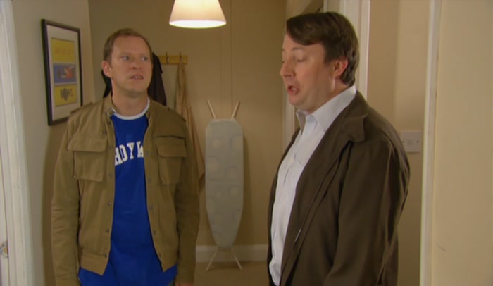 YES, HE CERTAINLY LIKES A LOT OF TOMATO SAUCE ON HIS CHIPS! 