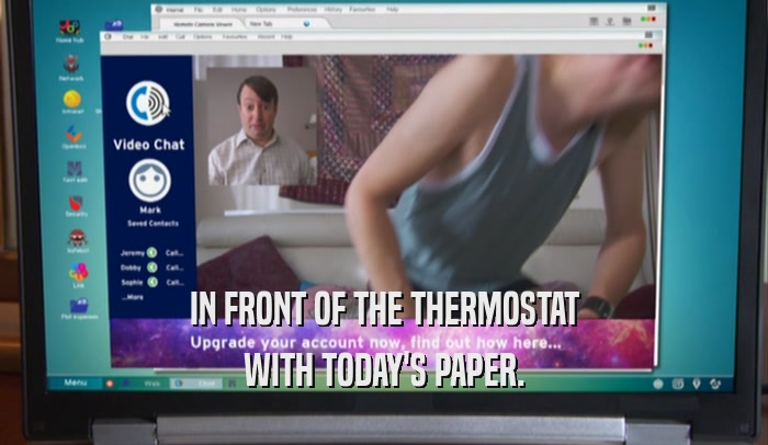 IN FRONT OF THE THERMOSTAT WITH TODAY'S PAPER. 