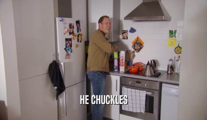 HE CHUCKLES  