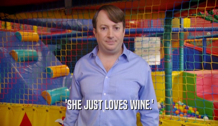 'SHE JUST LOVES WINE.'
  