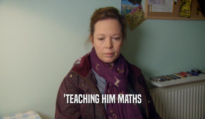 'TEACHING HIM MATHS  