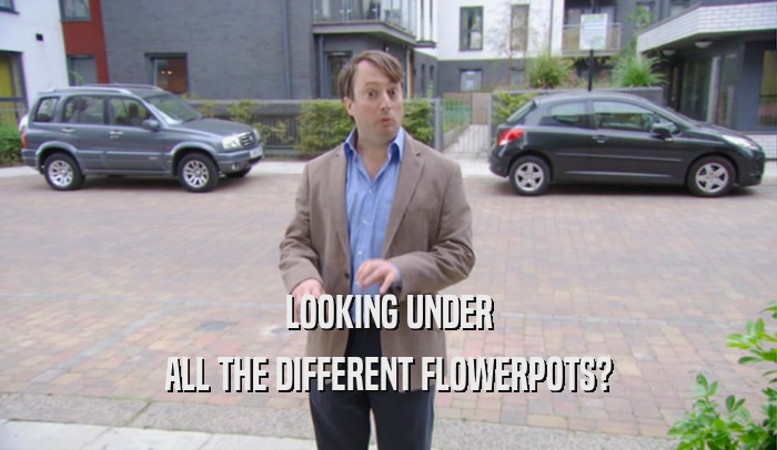 LOOKING UNDER ALL THE DIFFERENT FLOWERPOTS? 