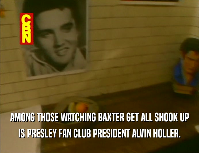 AMONG THOSE WATCHING BAXTER GET ALL SHOOK UP
 IS PRESLEY FAN CLUB PRESIDENT ALVIN HOLLER.
 