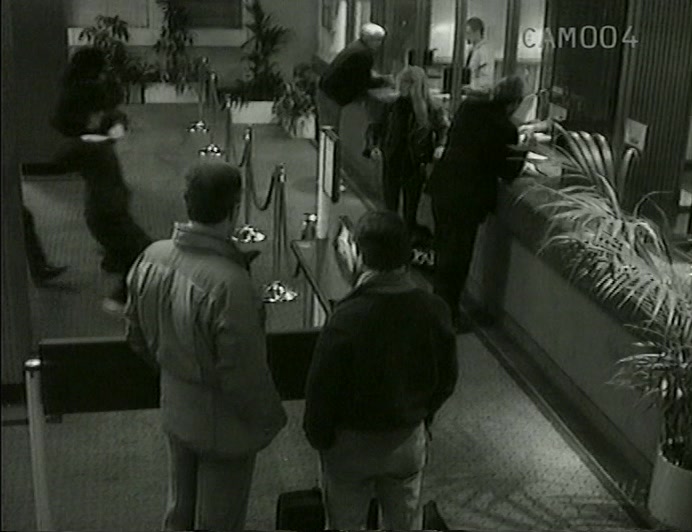 FIRST, THESE SCENES OF AN AUDACIOUS BANK ROBBERY WERE CAPTURED BY SUSAN BRIERS, 