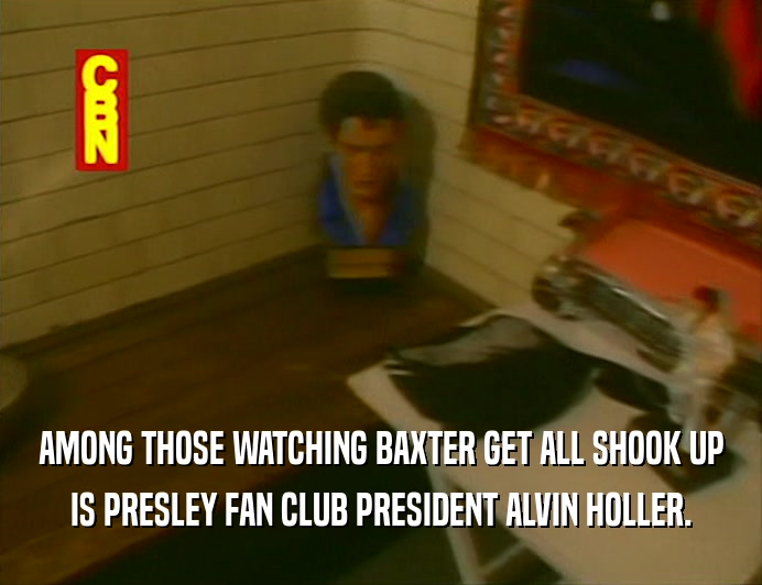 AMONG THOSE WATCHING BAXTER GET ALL SHOOK UP IS PRESLEY FAN CLUB PRESIDENT ALVIN HOLLER. 