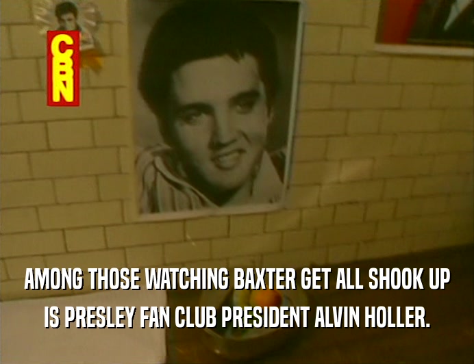 AMONG THOSE WATCHING BAXTER GET ALL SHOOK UP
 IS PRESLEY FAN CLUB PRESIDENT ALVIN HOLLER.
 