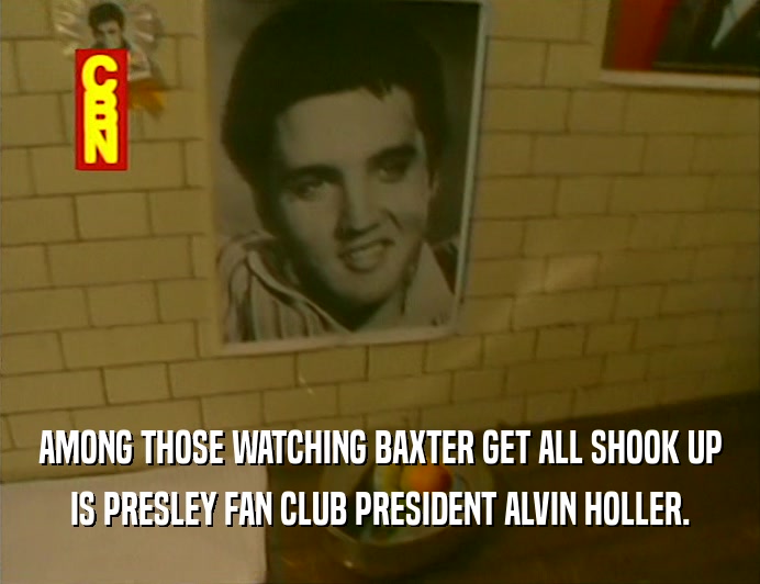 AMONG THOSE WATCHING BAXTER GET ALL SHOOK UP IS PRESLEY FAN CLUB PRESIDENT ALVIN HOLLER. 