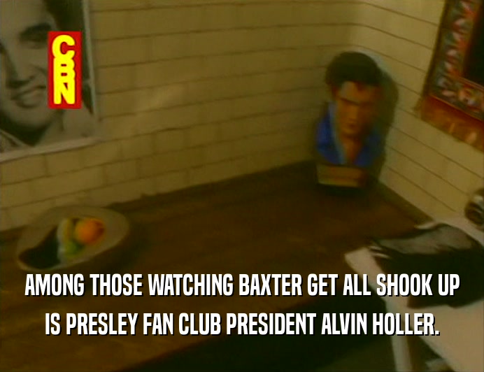 AMONG THOSE WATCHING BAXTER GET ALL SHOOK UP IS PRESLEY FAN CLUB PRESIDENT ALVIN HOLLER. 