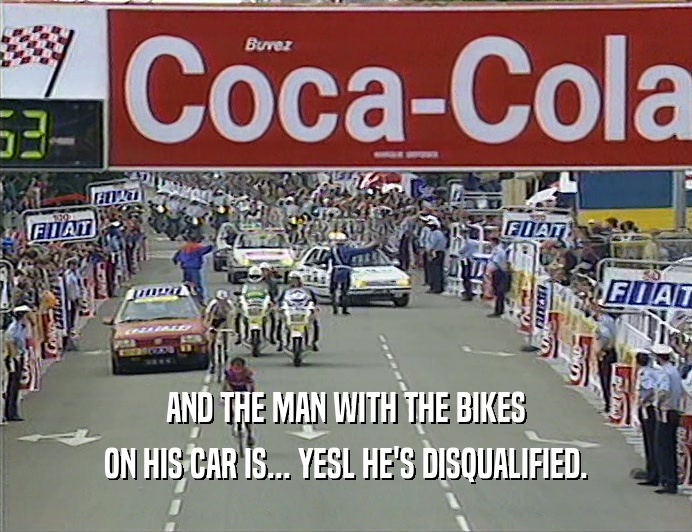 AND THE MAN WITH THE BIKES ON HIS CAR IS... YESL HE'S DISQUALIFIED. 