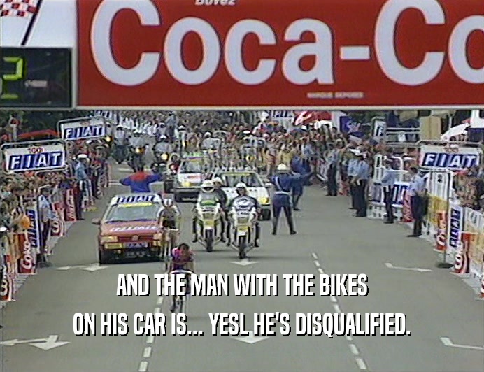 AND THE MAN WITH THE BIKES ON HIS CAR IS... YESL HE'S DISQUALIFIED. 
