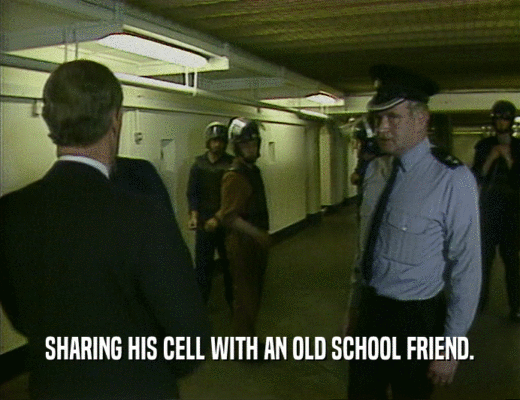 SHARING HIS CELL WITH AN OLD SCHOOL FRIEND.
  