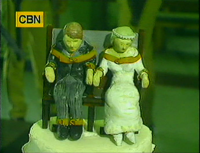 THERE'S EVEN A CAKE FOR THIS WEDDING WAKE,
 BUT FOR MINISTER ALVIN HOLLER,
 