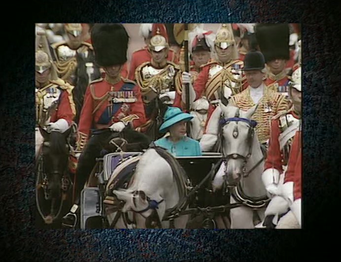 COMING UP - THE QUEEN MARCHES ON DOWNING STREET. THERE SHE IS IN A CART... 