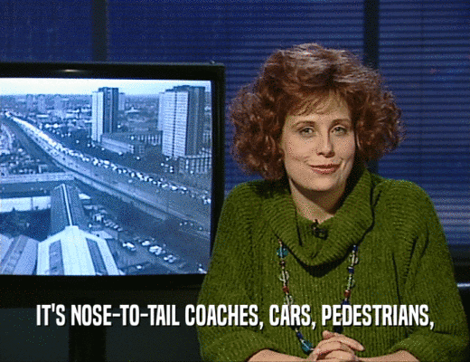 IT'S NOSE-TO-TAIL COACHES, CARS, PEDESTRIANS,  