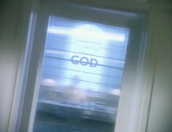 SHE BECKONED ME TOWARDS IT. THE DOOR SAID 