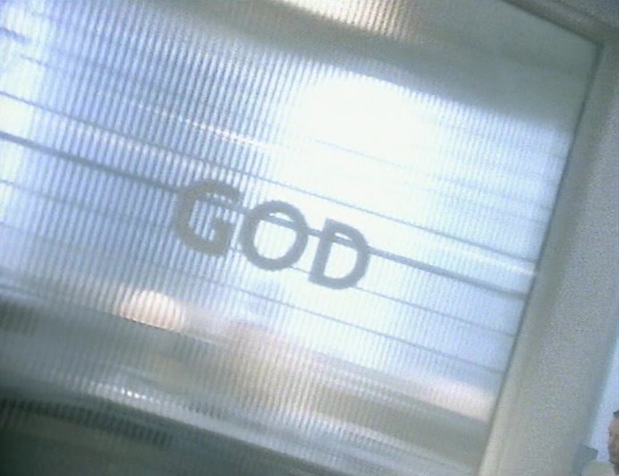 SHE BECKONED ME TOWARDS IT. THE DOOR SAID 