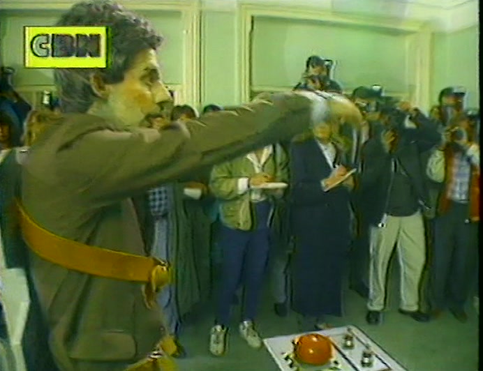 COLIN DECOMPOSES HIMSELF BEFORE DELIVERING A STIFF CHARGE TO BAXTER. 