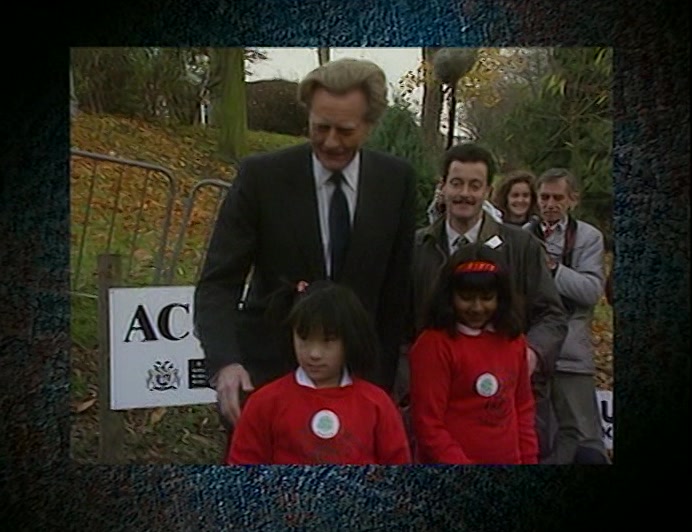 ...AND A HANDSHAKE FROM MICHAEL HESELTINE FOR THE CHILDREN HE IS ABOUT TO SHOOT. 