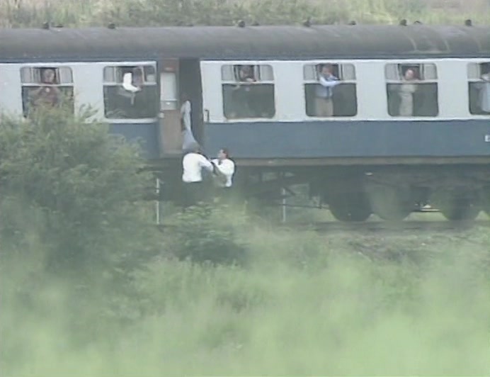 TWO COMMUTERS JUMPED HIM LIKE RAPTORS AND THREW HIM ABOARD. 