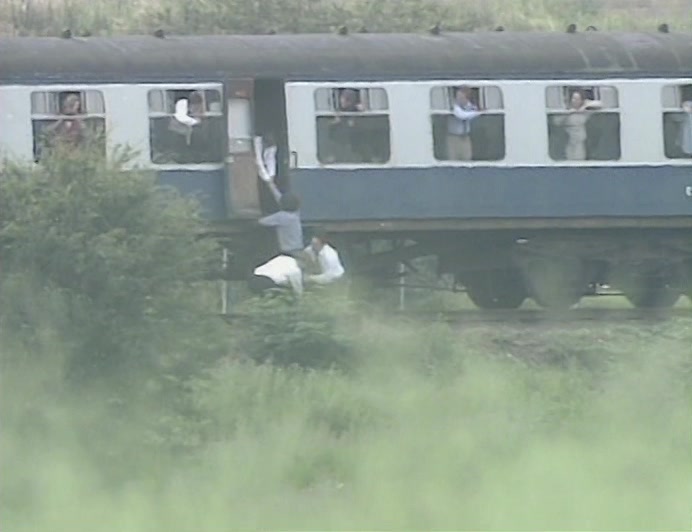 TWO COMMUTERS JUMPED HIM LIKE RAPTORS AND THREW HIM ABOARD. 