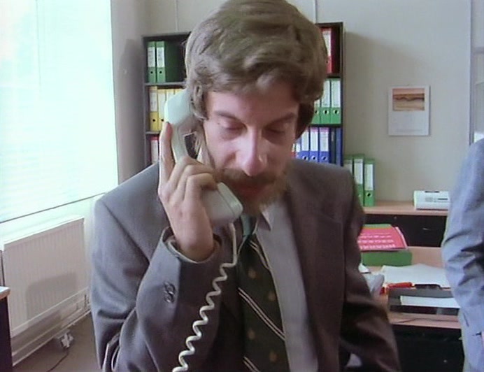 HELLO? UM... UM... WE'RE A BIT... TIED UP AT THE MOMENT. C-CAN IT WAIT? 