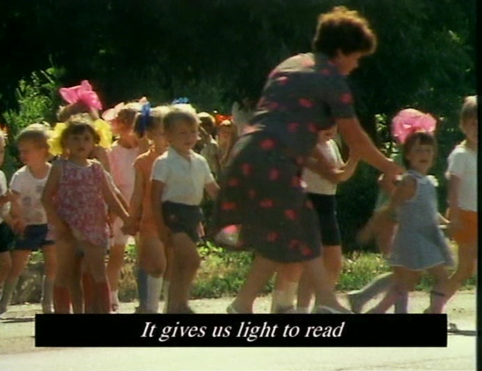 AFTER SCHOOL, THE CHILDREN QUEUE UP FOR THEIR PLUTONIUM, 