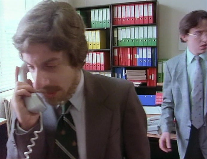 HELLO? UM... UM... WE'RE A BIT... TIED UP AT THE MOMENT. C-CAN IT WAIT? 