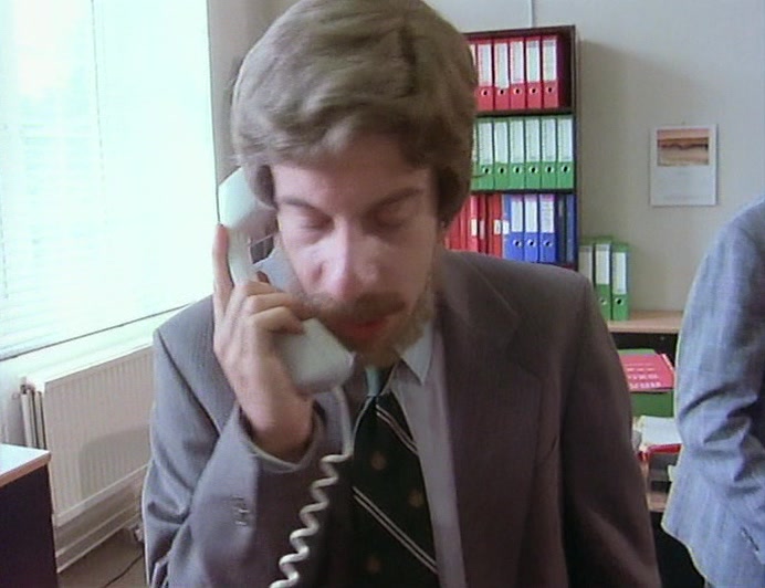 HELLO? UM... UM... WE'RE A BIT... TIED UP AT THE MOMENT. C-CAN IT WAIT? 