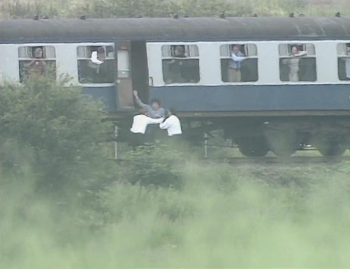 TWO COMMUTERS JUMPED HIM LIKE RAPTORS AND THREW HIM ABOARD. 