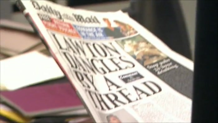 - (MALCOLM) ''LAWTON DANGLES BY A THREAD''? - YEAH. ''DANGLES BY A THREAD''. 