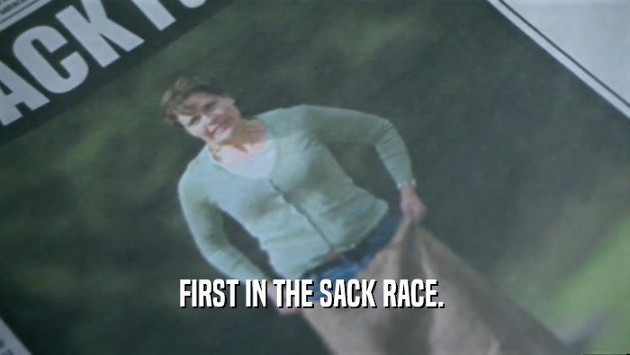FIRST IN THE SACK RACE.   