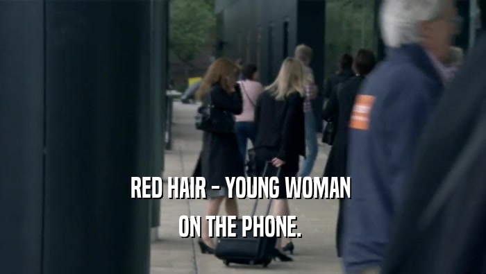 RED HAIR - YOUNG WOMAN 
 ON THE PHONE. 
 