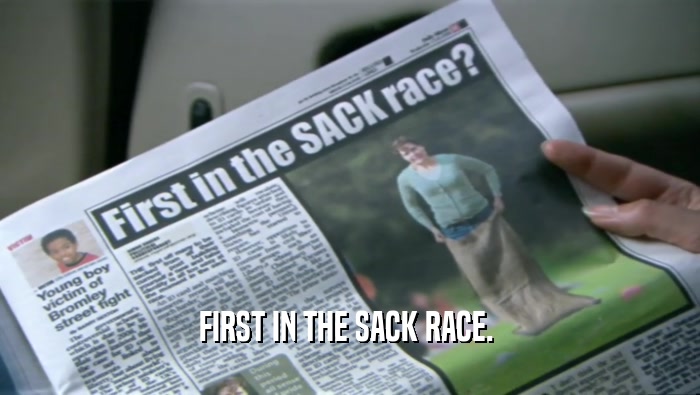 FIRST IN THE SACK RACE.   