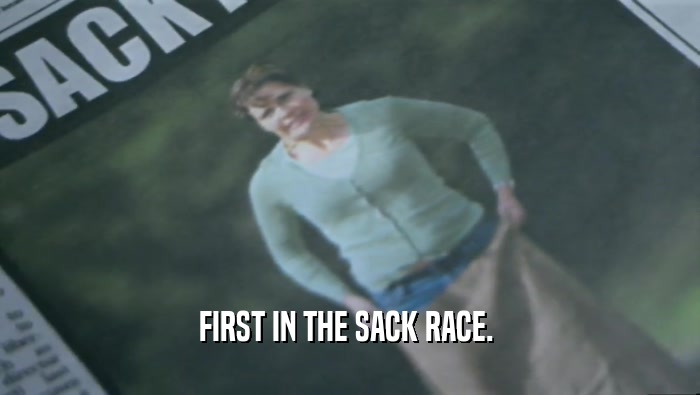 FIRST IN THE SACK RACE.   