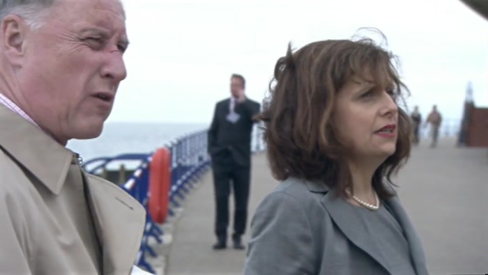 IS THAT HER? OH, NO. TWO BLOKES.  