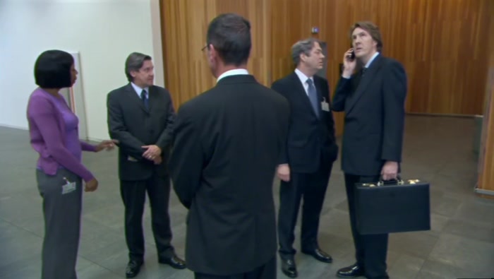 WHO'S THAT BLOKE STARING AT US?  